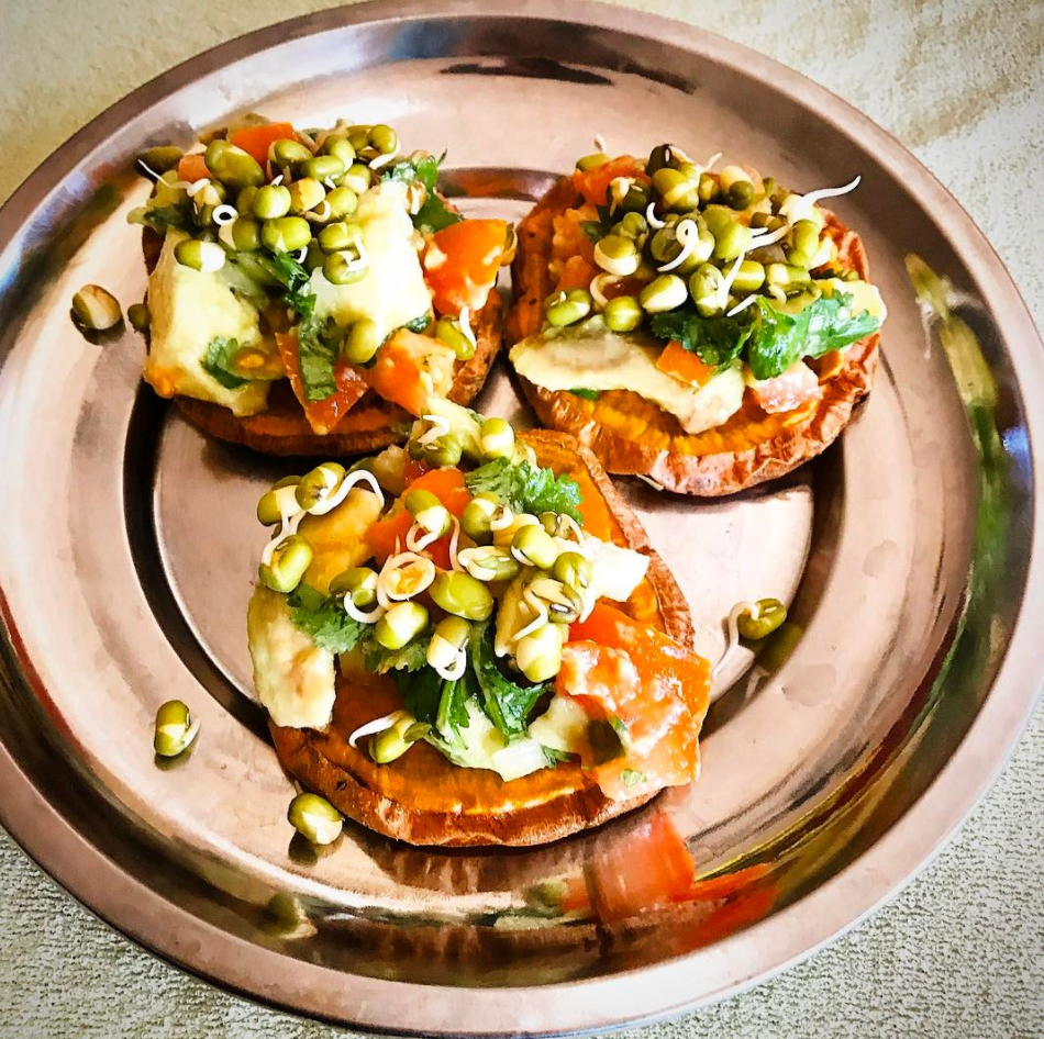 Sweet Potato toast with chunky guacamole and home sprouted moong beans.