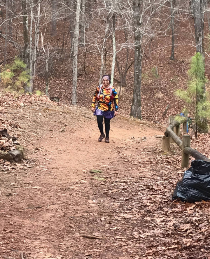 Can you see the bottom of the trail where we climbed up from? Yeah, neither can I. Photo: Laura at Aid Station 3 and 4. 